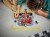 LEGO City 60443 - F1 Pit stop i mechanicy z bolidem Ferrari